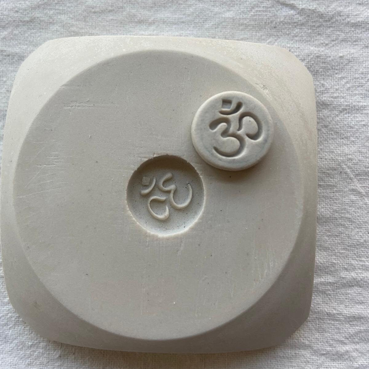 Ohm ceramic earrings